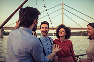 Storytelling - Man telling a story to a group of people